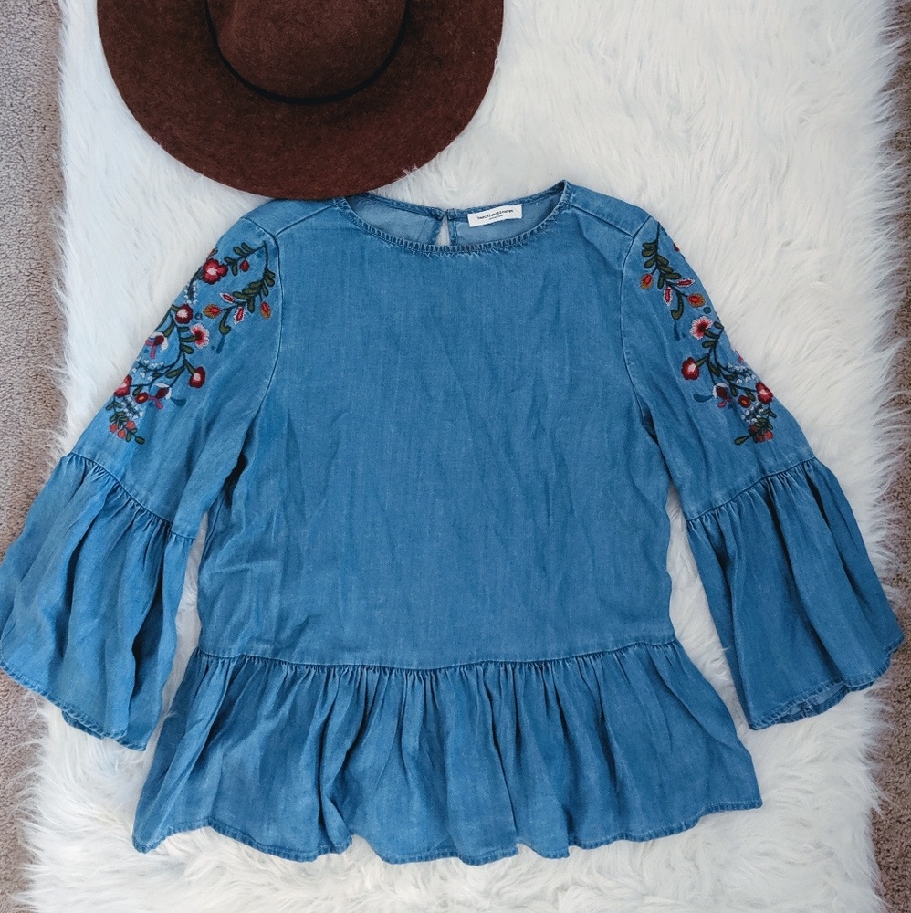 Embroidered peplum top